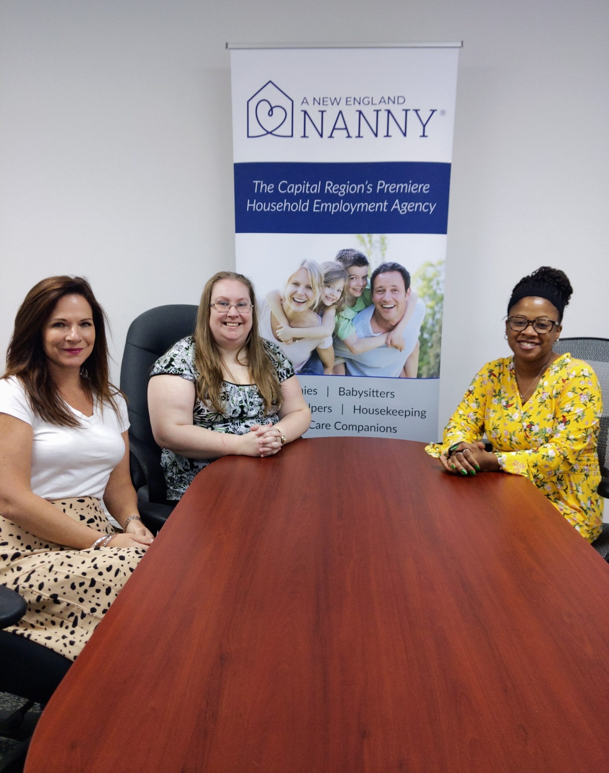 staff of A New England Nanny seated